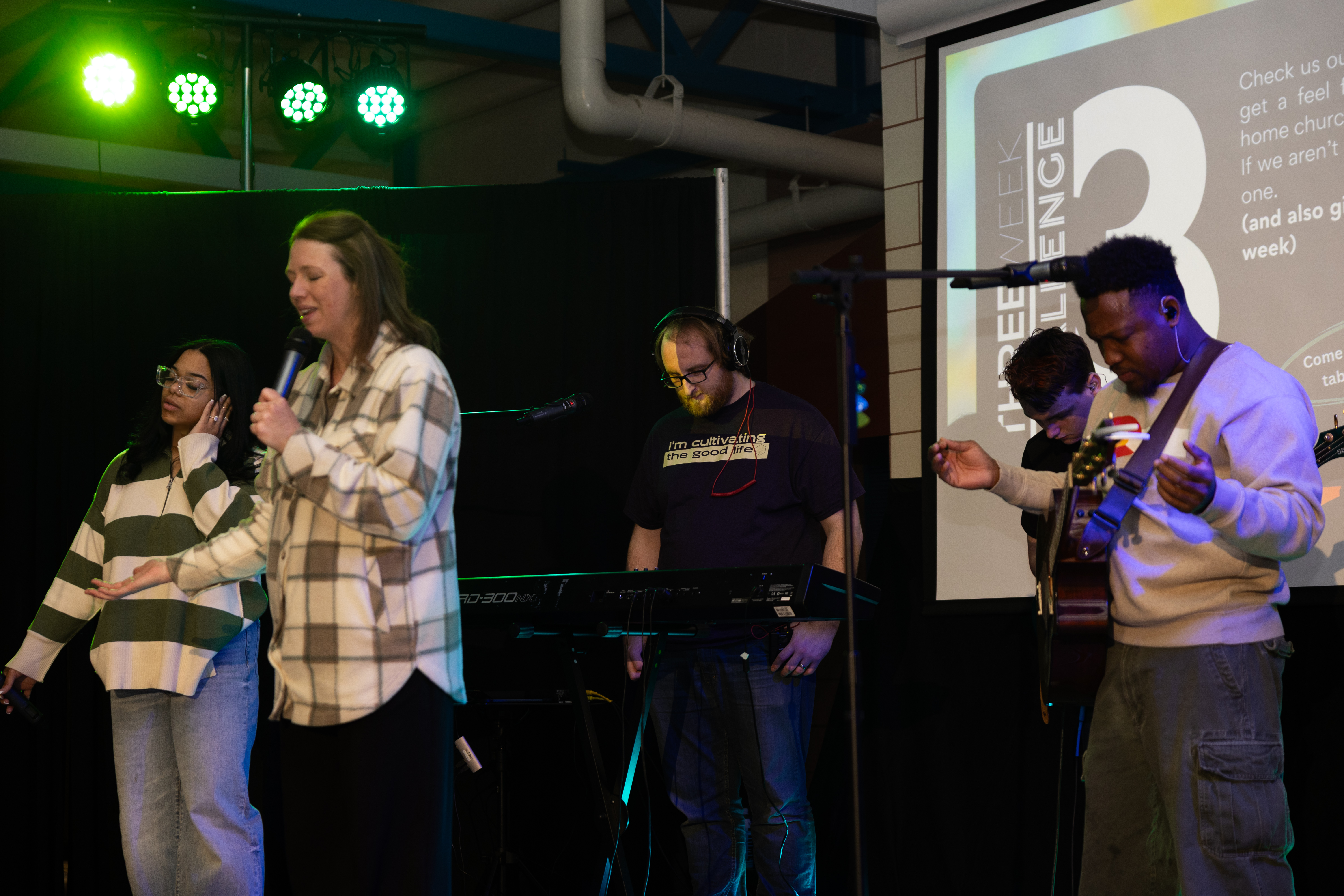 Worship team leading music during a faith gathering